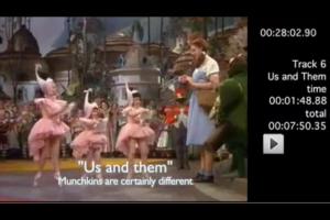 The Munchkins "dance" to Us and Them...